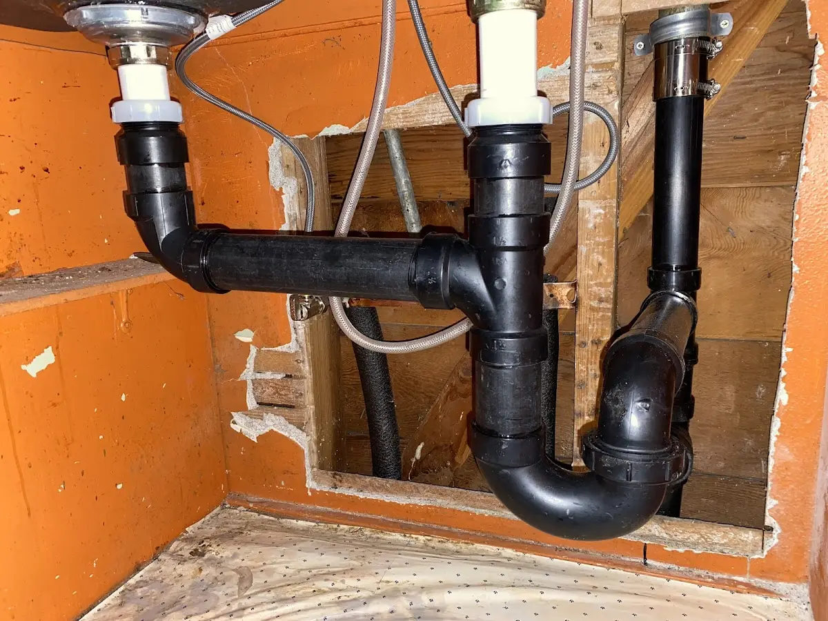 Professional Garbage Disposal Repair equipment and tools on the job in Oakbrook
